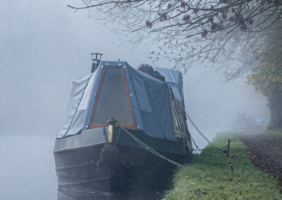 Long boat in mist